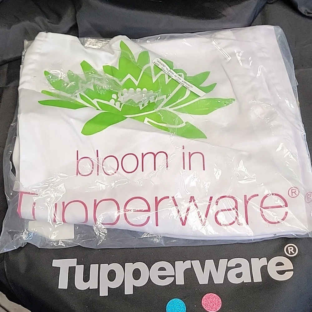 New Set of 2 Tupperware Aprons that say "Bloom in Tupperware". - Picture 1 of 1